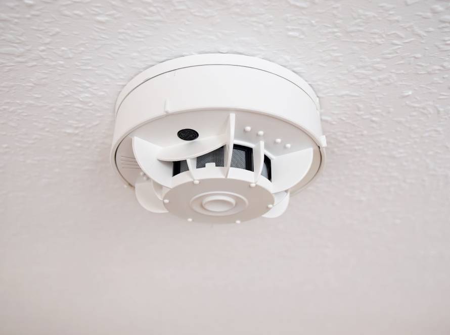 Smoke detector mounted on the ceiling for fire alarm protection